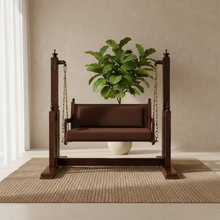 Load image into Gallery viewer, Decorative swing with a plant on a neutral background

